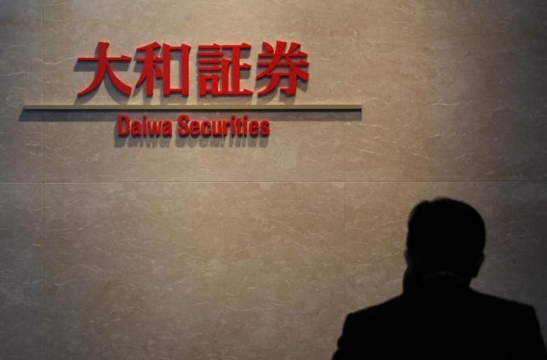 A logo of Daiwa Securities is pictured at the company's lobby in Tokyo December 21, 2012. REUTERS/Yuriko Nakao