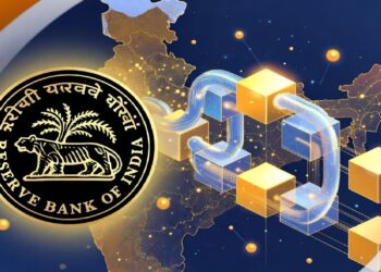 Emblema del Banco de la Reserva de la India junto a un mapa iluminado con nodos conectados y una cadena digital que cruza el país, evocando redes financieras y tecnología aplicada al sistema nacional.