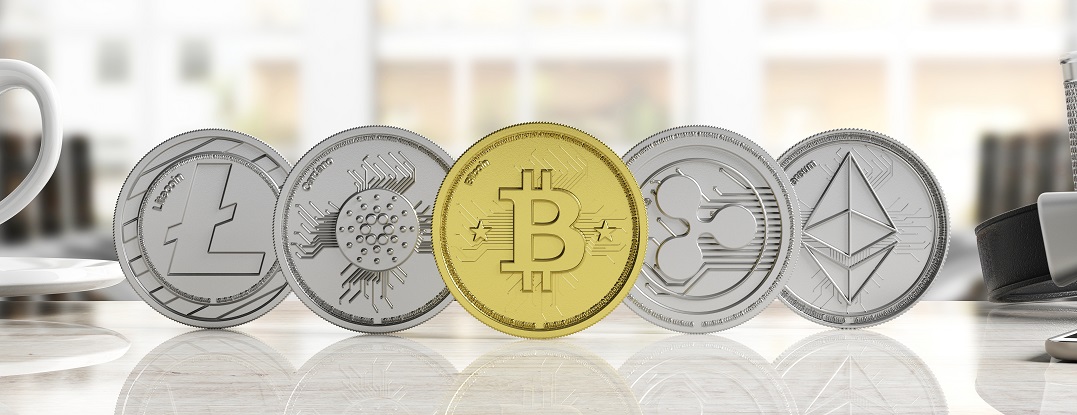 Cryptocurrency concept. Golden bitcoin and variety of silver virtual coins on blur background, banner, front view. 3d illustration