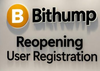 Logo con una B de Bithump y un mensaje. Pared blanca, cuarto iluminado.