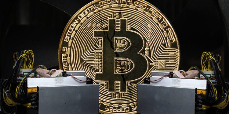 Dos mineros Bitmain en contra con una criptomoneda de bitcoin agrietándose.