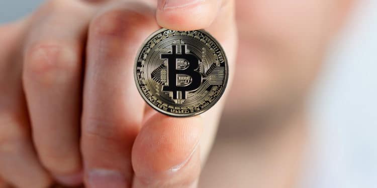 bitcoin mano criptomoneda saludable