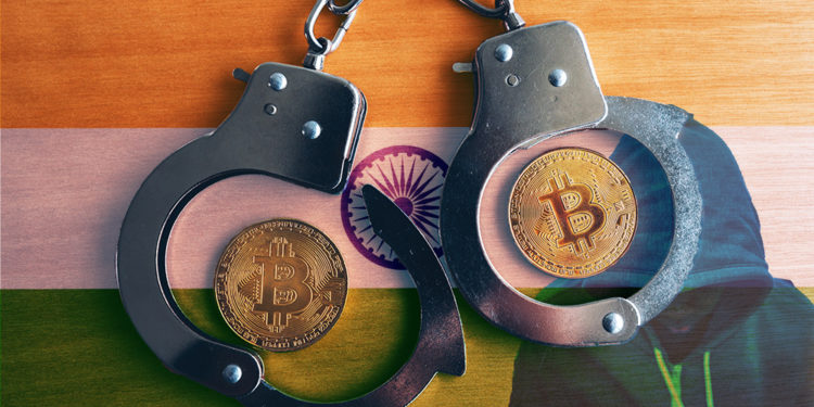 Monedas de Bitcoin dentro de esposas con bandera de India y hacker en el fondo. Composición por CriptoNoticias. stevanovicigor / elements.envato.com; rawpixel.com / freepik.com; Rawpixel / elements.envato.com.