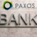 Cartel de banco sobre pared de mármol y logo de Paxos. Composición por CriptoNoticias Fuentes:  rawf8 /  elements.envato.com   ; paxos /  paxos.com .