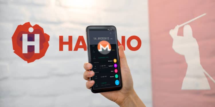 Teléfono con wallet y logo de monero en habitación con logos de Havano y Samourai Wallet.