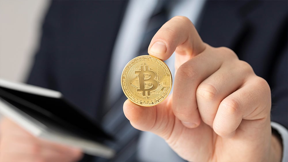 Bitcoin y ejecutivo.