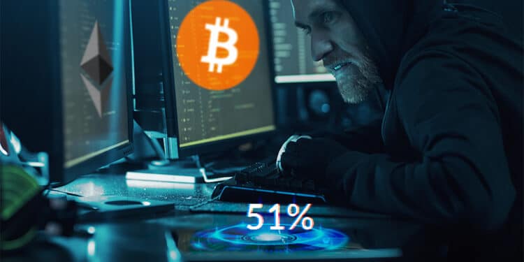 Hacker con dos pantallas, una bitcoin y otra ether y 51% sobre su teléfono.