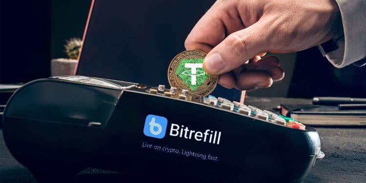 Persona pagando con Tether en medio de pago Bitrefill