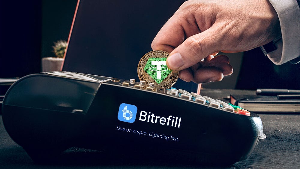 Persona pagando con Tether en medio de pago Bitrefill