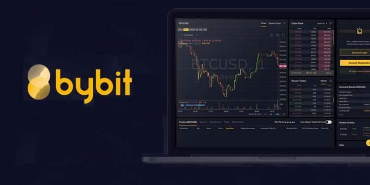 Logo del exchange Bybit junto a laptop