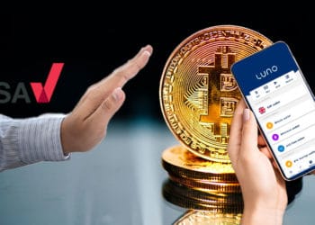 Mano con logo de ASA rechazando bitcoin y exchange luno.