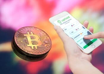 Bitcoin y teléfono con Uphold.