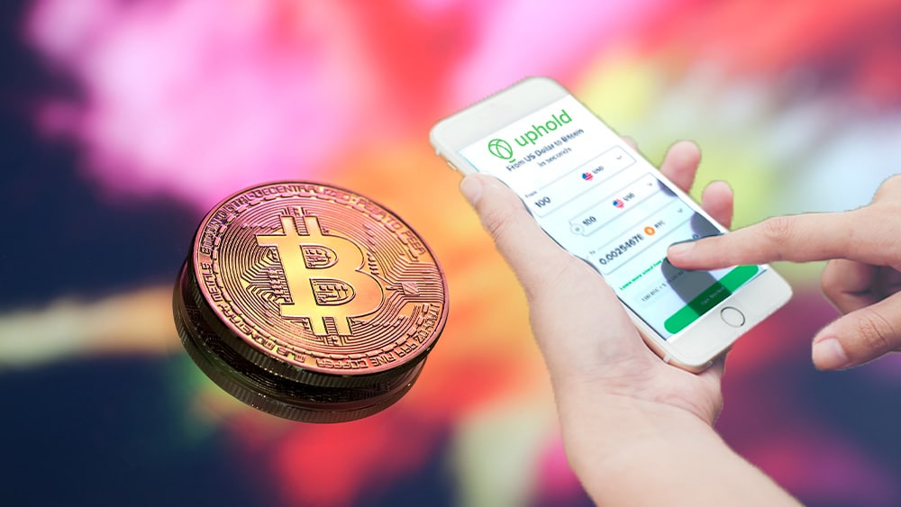 Bitcoin y teléfono con Uphold.