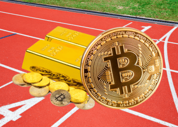 Oro y bitcoin en pista de atletismo.