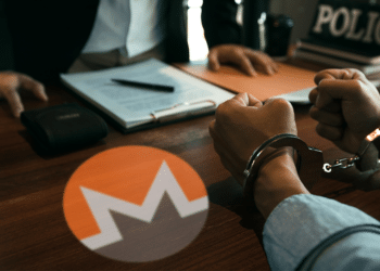 Mesa de policía con logo Monero