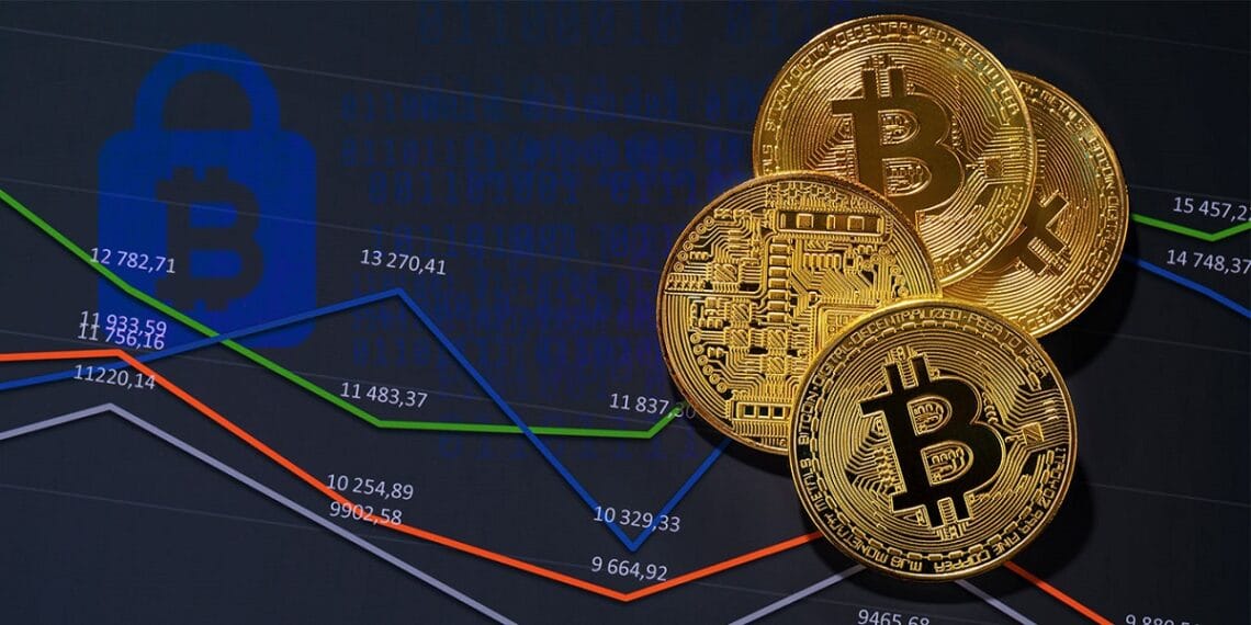 Monedas bitcoins sobre gráficas de precio