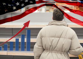 Estantes vacíos con bandera de USA y gráfica en alza.