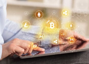 Las empresas multinacionales aprovechan cada vez más las nuevas tecnologías y las criptomonedas. Fuente: ra2 studio / stock.adobe.com