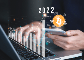 Reconocidos analistas de mercado son optimistas con sus predicciones sobre bitcoin en 2022. Fuente: Deemerwha studio / stock.adobe ; cryptologos.