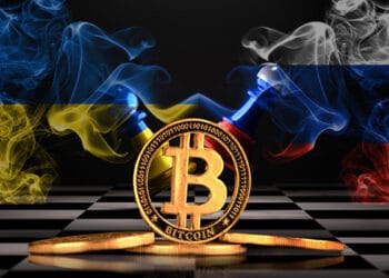 bitcoin ha perdido valor de mercado en medio del conflicto entre Rusia y Ucrania. Composición por CriptoNoticias. Dilok/ stock.adobe.com; Vlad/ stock.adobe.com; promesaartstudio/ stock.adobe.com