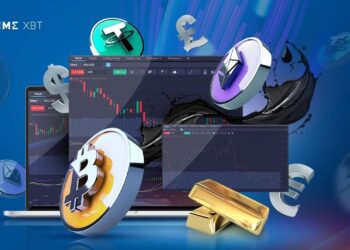 Monedas de bitcoin, Ether, dólar y lingotes de oro entremezclados con monitores de computadores