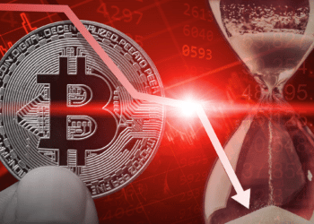 Bitcoin acompañado de un reloj de arena y un gráfico bajista.