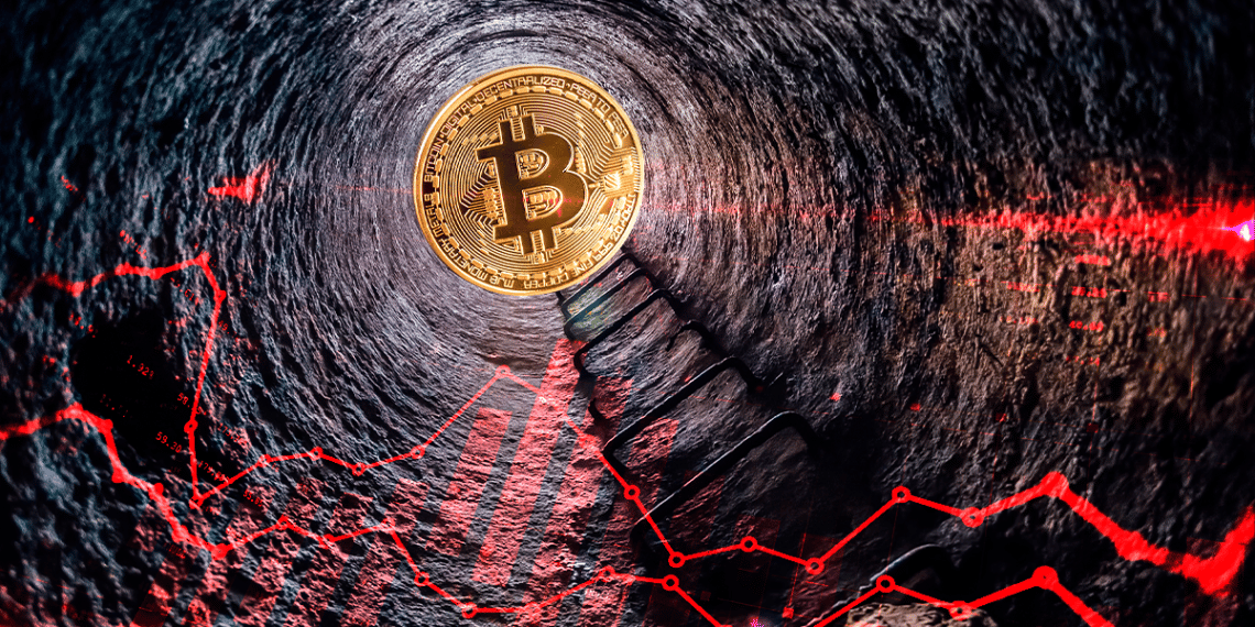 Fondo del pozo con bitcoin y gráfico rojo.