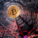 Fondo del pozo con bitcoin y gráfico rojo.