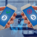 Celulares realizando una transacción con bitcoin.