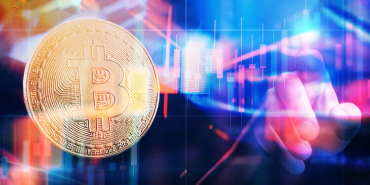 Mano de trader tocando gráfico de analisis de bitcoin