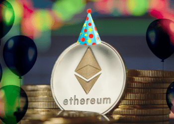 Ethereum con globos y sombrero de cumpleañito.