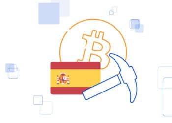 Bitcoin junto a pico de minería acompañado de la bandera de España.