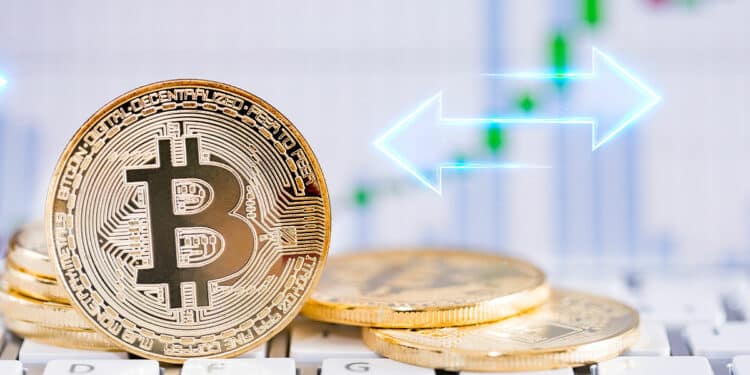 monedas de bitcoin con gráficos de precio en el fondo