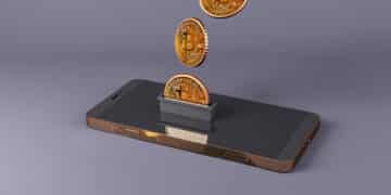 Bitcoins ingresando en una wallet en el celular.