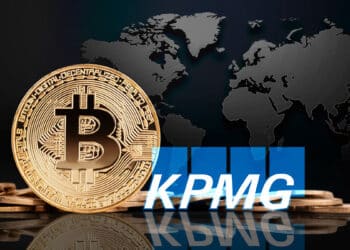 Bitcoin junto al logo de KPMG acompañado de un mapa mundial de findo.