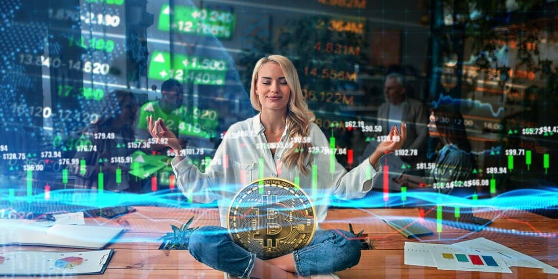 mujer meditando con moneda de bitcoin en sus piernas con gráficos de mercado en el fondo