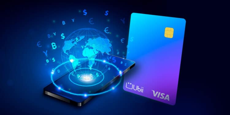 Tarjeta Visa Mastercard de ubii para realizar pagos internacionales, junto a celular con mundo y criptomonedas.