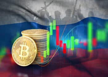 Bitcoin junto a un gráfico de mercado acompañado de la bandera de Rusia.