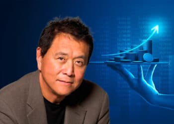 Robert Kiyosaki y una mano sosteniendo inversiones