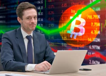 trader con gráfico de stock market al fondo