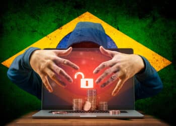 Hacker robando criptomonedas acompañado con a bandera de Brasil.