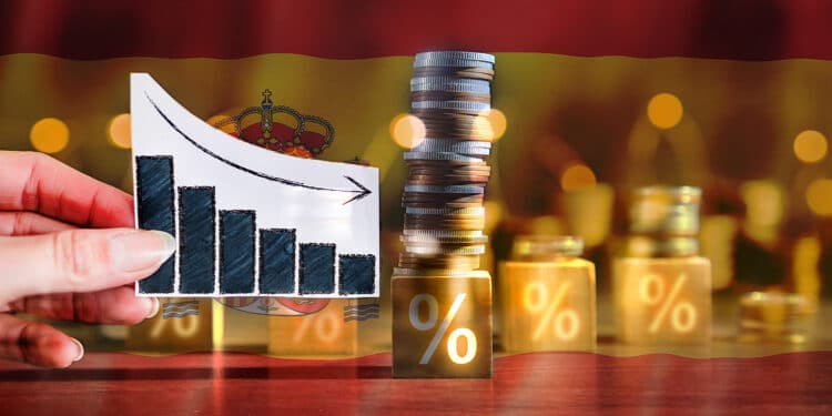 Gráfico decreciente, que hace referencia a la inflación junto a bandera de España.
