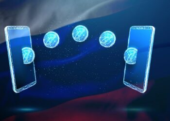 monedas digitales pasando entre teléfonos móviles con bandera de rusia en el fondo