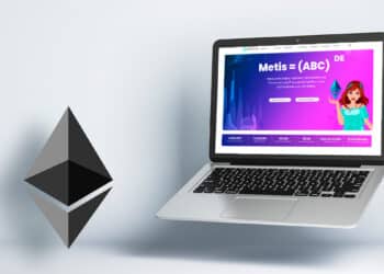 Ethereum junto a computadora con el sitio web de Metis.