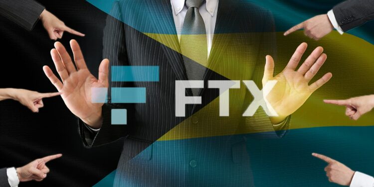 hombre de negocios con gesto de rechazo hacia manos que le señalan detrás de bandera de Las Bahamas con logo de FTX superpuesto