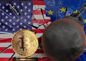 Bitcoin junto a la bandera de Estados Unidos y Europa.