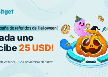 Calabaza sobre plato aludiendo a Halloween y el logo de Bitget