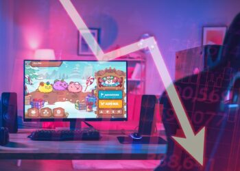 silla de gamer vacía con pantalla en juego de Axie Infinity con gráfico y felcha cayendo superpuesto