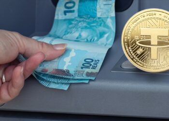 moneda de tether sobre cajero