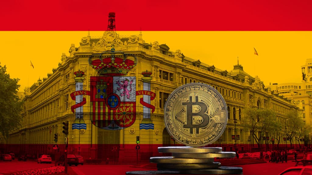 Bitcoin junto a bandera y banco de España.